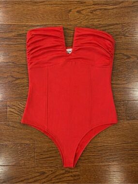 by the way. Strapless Red One-Piece Bodysuit with V-Notching